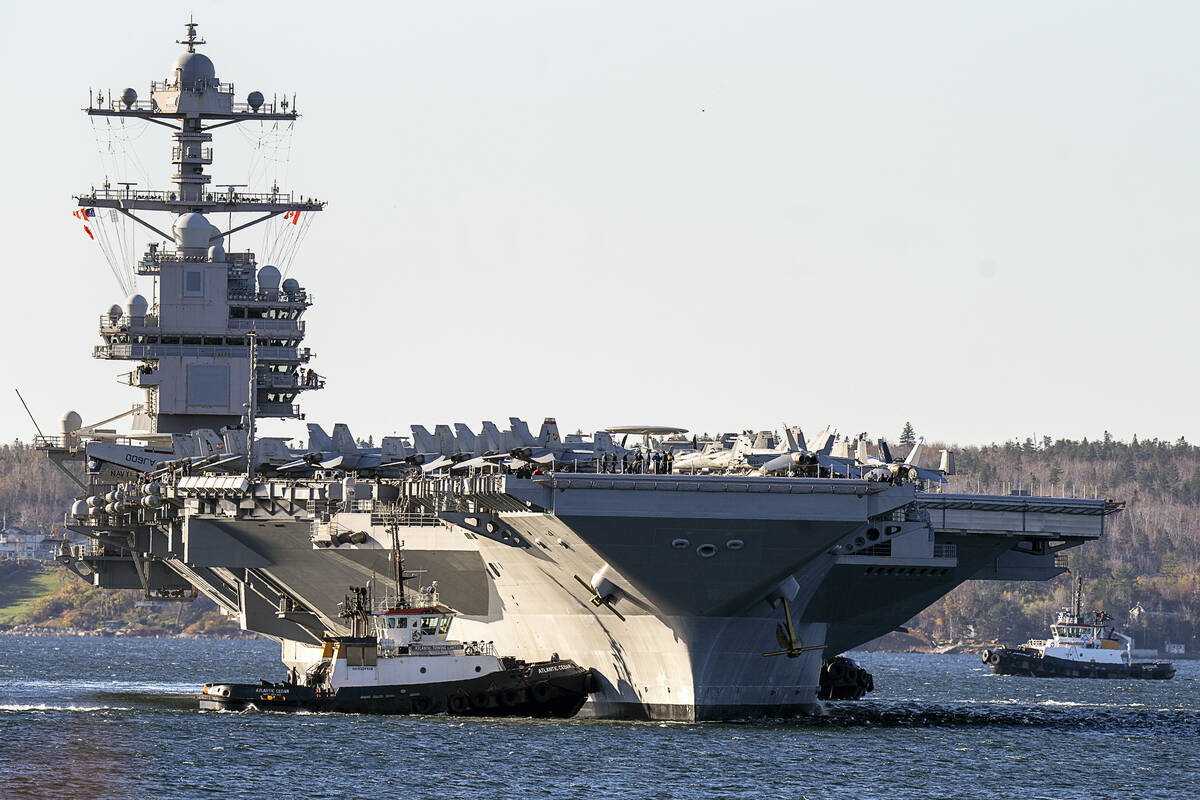 The USS Gerald R. Ford arrives in Halifax, Nova Scotia, on Oct. 28, 2022. Within hours of the h ...
