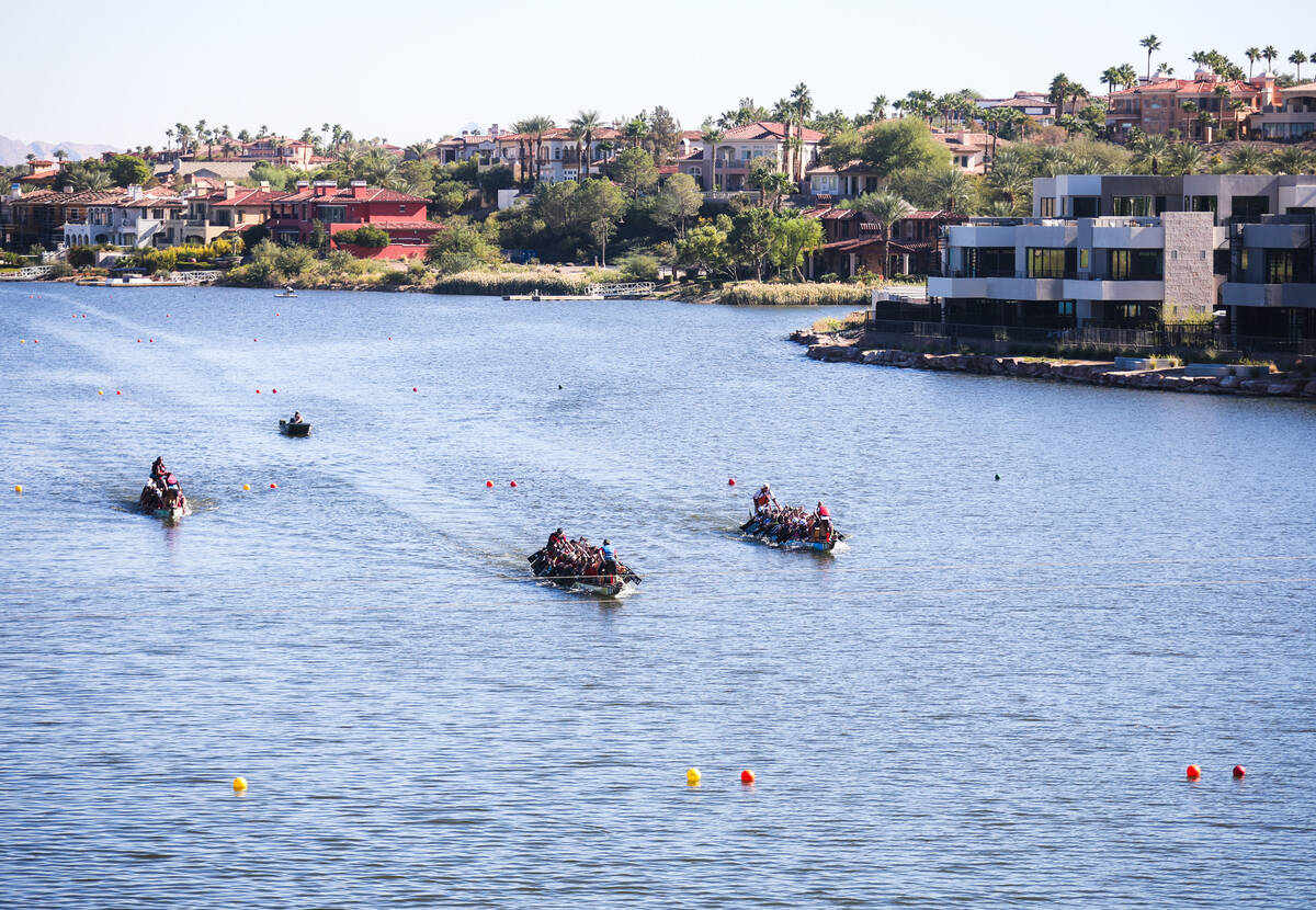 Contestants race to the finish line at the Nevada Dragon Boat Festival at Lake Las Vegas in Hen ...