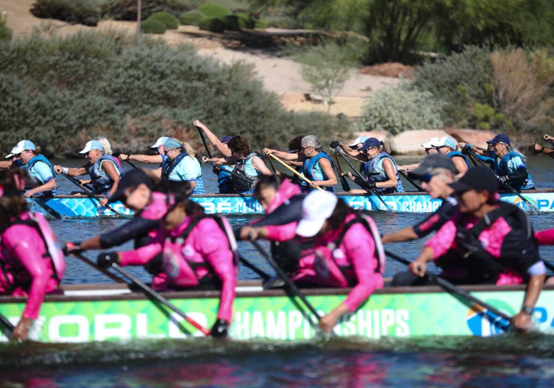 Contestants race to the finish line at the Nevada Dragon Boat Festival at Lake Las Vegas in Hen ...