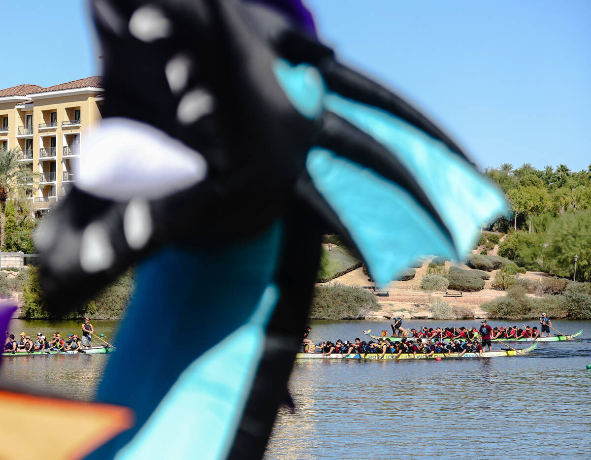 Contestants race to the finish line at the Nevada Dragon Boat Festival at Lake Las Vegas in Hen ...