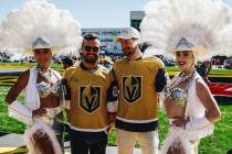 Golden Knights teammates Adin Hill, second from right, and William Carrier, second from left, p ...