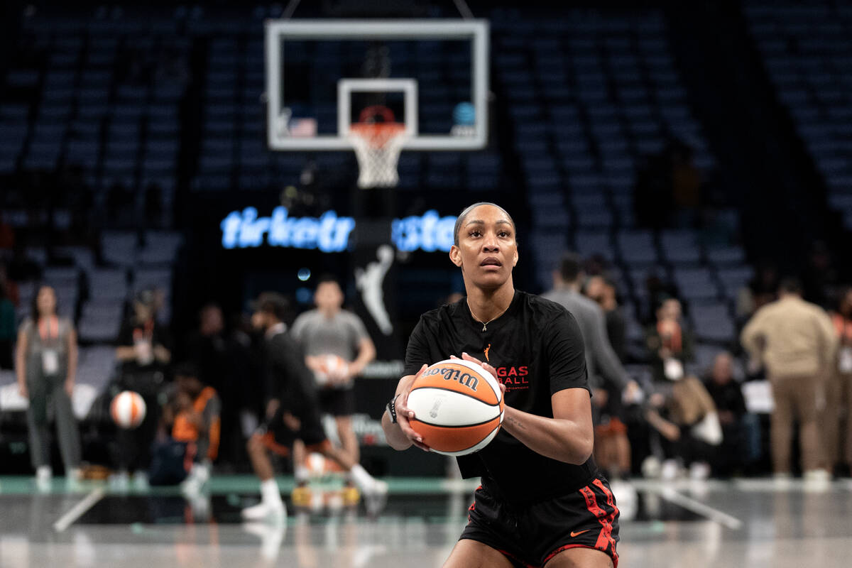 Las Vegas Aces forward A'ja Wilson warms up before Game 3 of a WNBA basketball final series aga ...