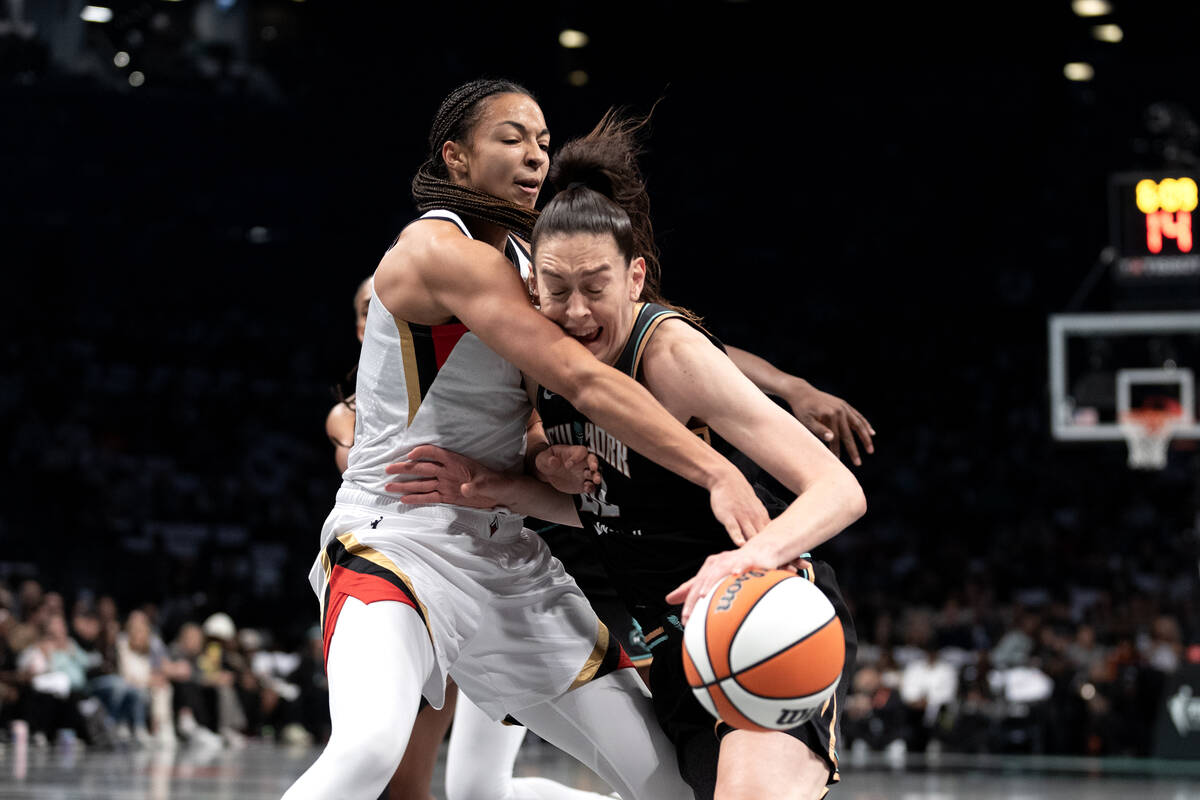 Las Vegas Aces center Kiah Stokes (41) defends against New York Liberty forward Breanna Stewart ...