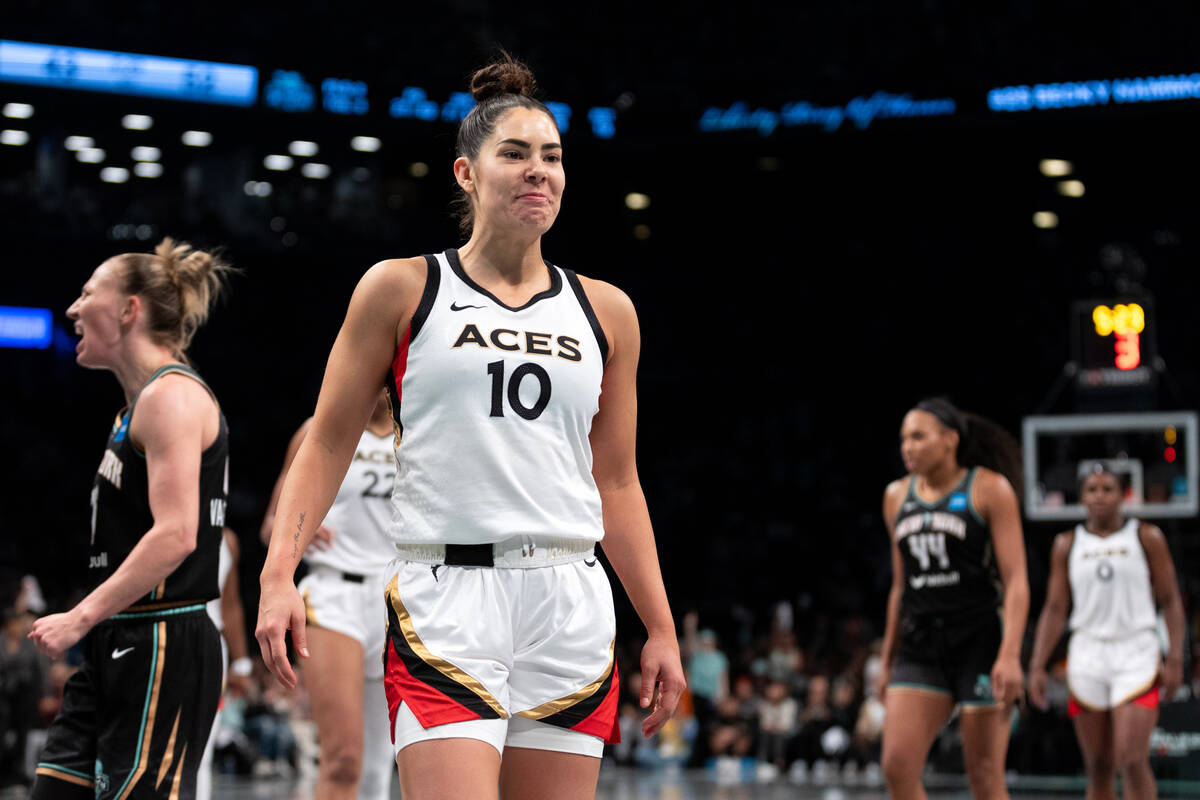 Las Vegas Aces guard Kelsey Plum (10) reacts after referees charged her with an offensive foul ...
