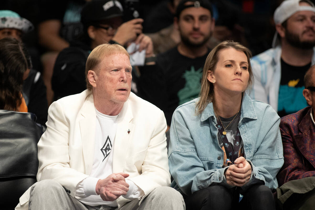 Las Vegas Aces owner Mark Davis sits courtside next to the Chicago Sky’s Allie Quigley d ...