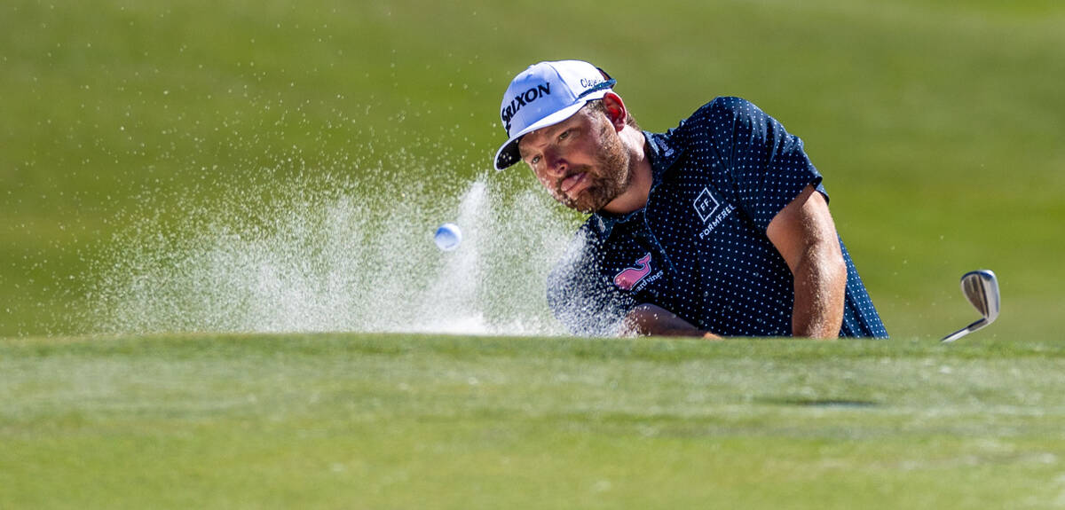 Matt NeSmith wedges out of the sand trap on hole 9 during final day play at the Shriners Childr ...