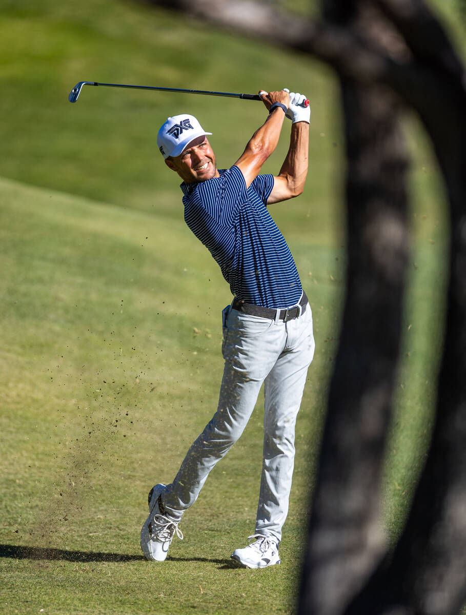 Eric Cole hits a the ball in the fairway at hole 18 during final day play at the Shriners Child ...