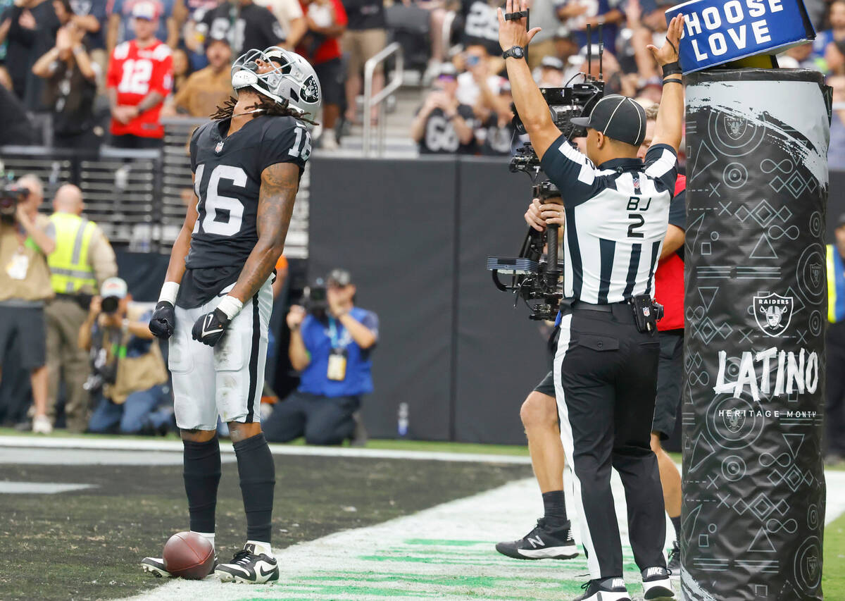 Raiders wide receiver Jakobi Meyers (16) celebrates his touchdown during the first half of an N ...