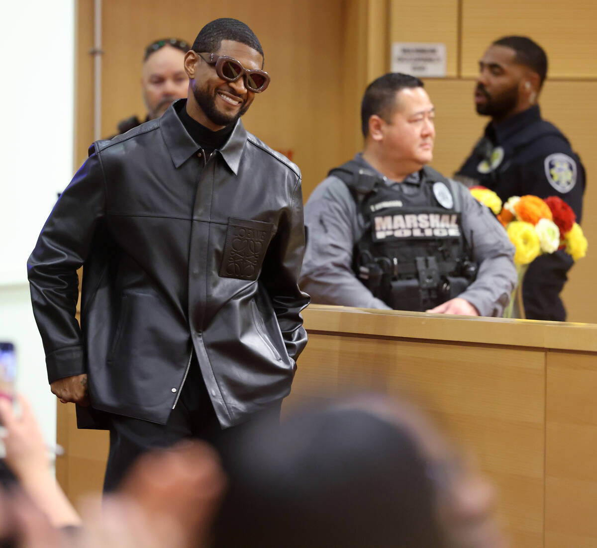Usher Raymond IV arrives at Las Vegas City Hall chambers before being honored by Mayor Carolyn ...