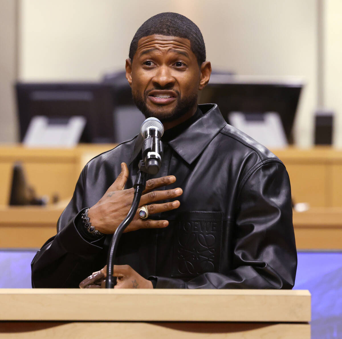 Usher Raymond IV speaks after receiving a key to the City of Las Vegas and a proclamation marki ...