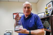 Stowe Shoemaker displays a Hospitality Heroes Award that he received from the LVCVA for his wor ...