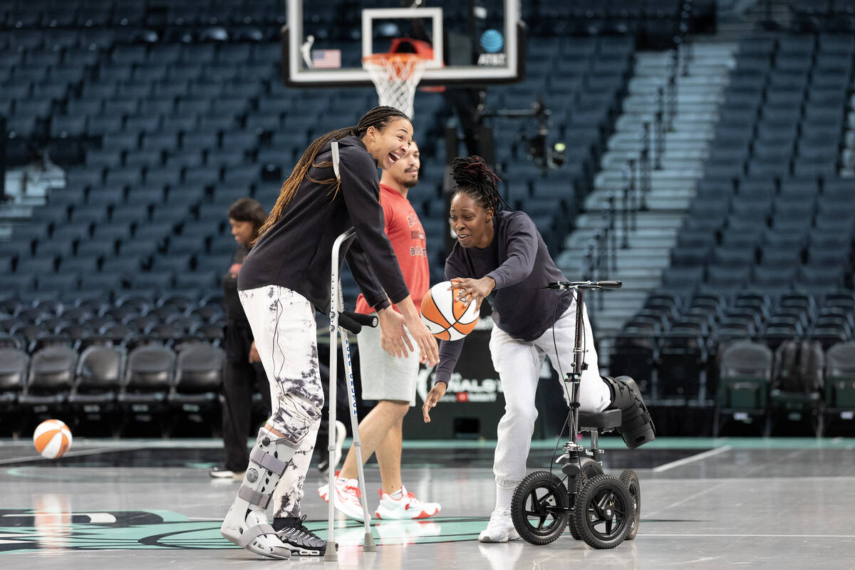 Las Vegas Aces center Kiah Stokes and guard Chelsea Gray, both injured in Game 3, fake play one ...