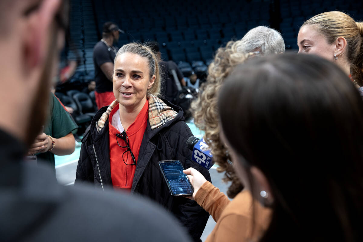 Las Vegas Aces head coach Becky Hammon speaks to reporters during a media availability ahead of ...