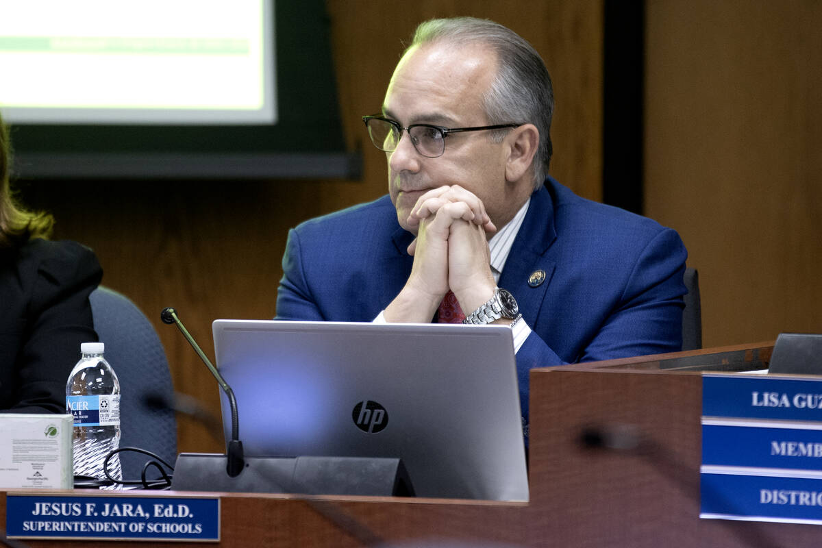 Clark County School District Superintendent Jesus Jara listens to protests during a school boar ...