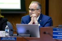 Clark County School District Superintendent Jesus Jara listens to protests during a school boar ...