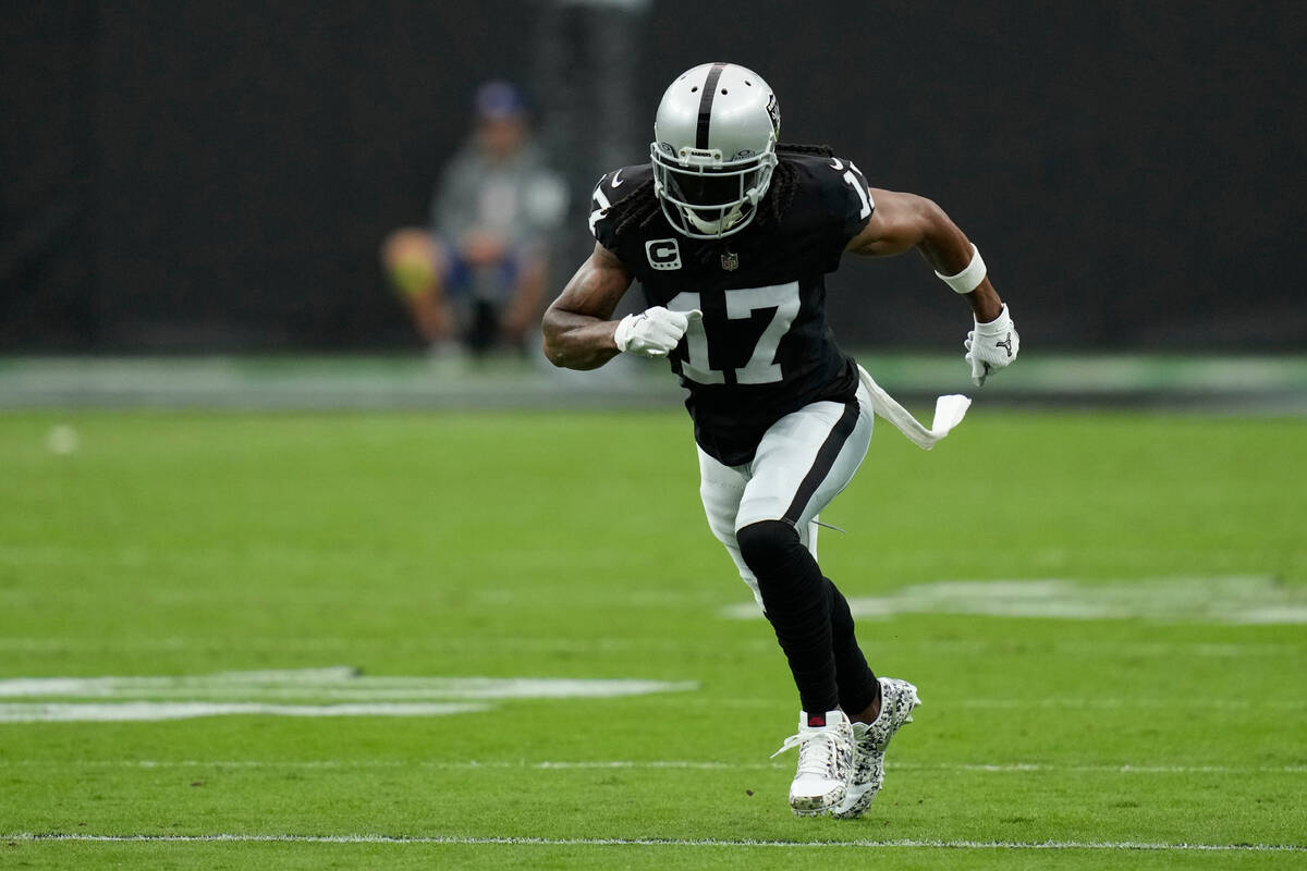 Las Vegas Raiders wide receiver Davante Adams (17) plays against the New England Patriots durin ...