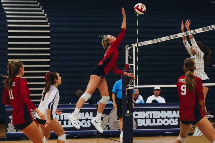 Coronado outside hitter Julie Beckham (2) smacks the ball across the net during a game against ...