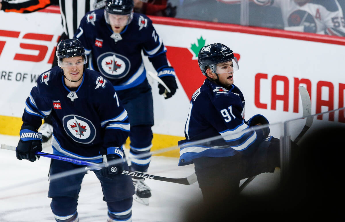Winnipeg Jets' Cole Perfetti (91) celebrates after his goal against the Vegas Golden Knights du ...