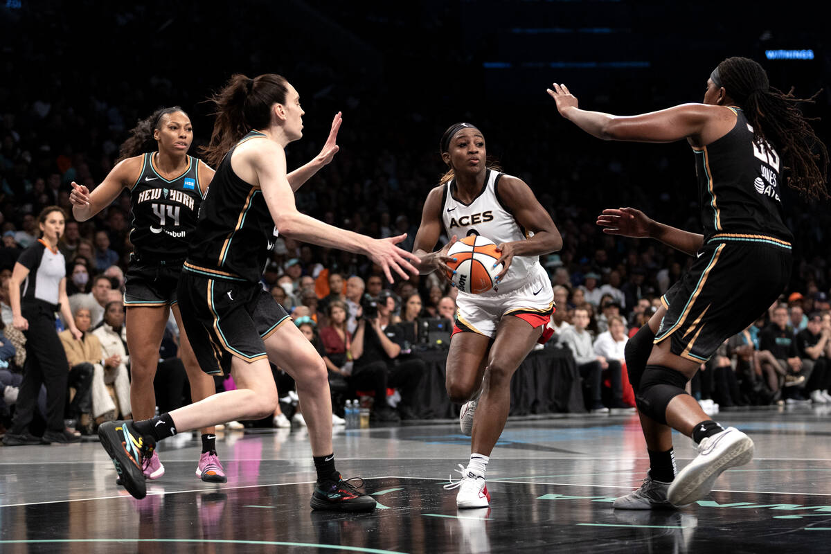 New York Liberty forward Breanna Stewart (30) and forward Jonquel Jones (35) close in on Las Ve ...