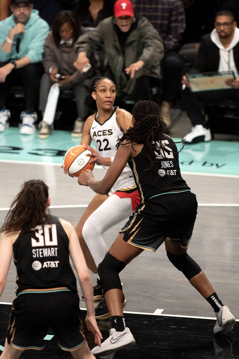 Las Vegas Aces forward A'ja Wilson (22) prepares to shoot against New York Liberty forward Jonq ...