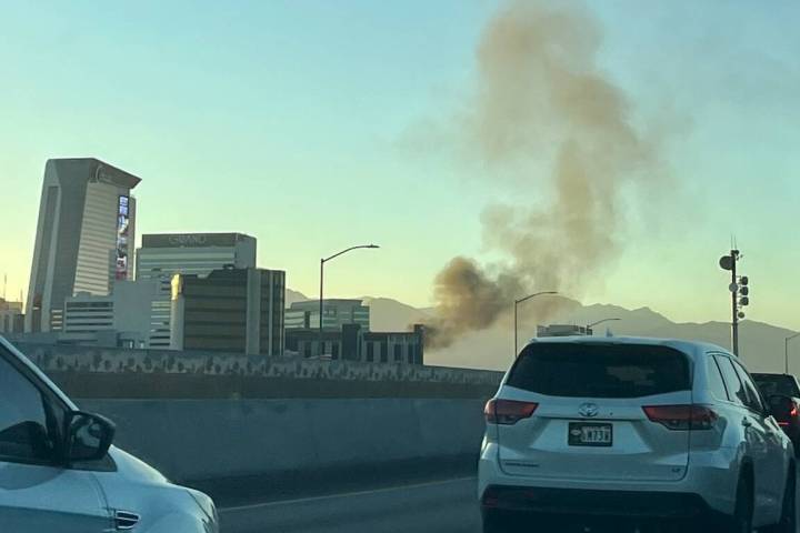 Smoke rises from the scene of a crash on Interstate 515 east of Interstate 15 in downtown Las V ...