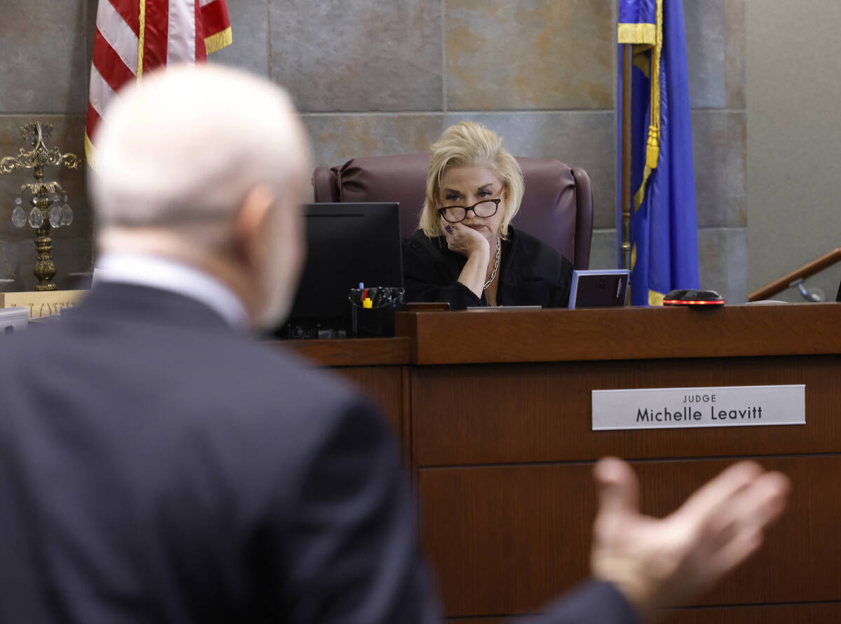 District Judge Michelle Leavitt listens to Joel Tasca, representing the Review-Journal, address ...