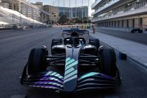 A Formula One show car is transported from the F1 Pit Building after a news conference on Oct. ...