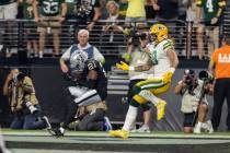 Las Vegas Raiders Amik Robertson (21) intercepts a pass late in the game against the Green Bay ...