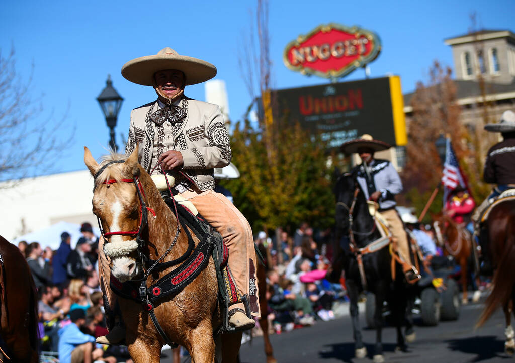 Members of Escaramuza Charra Perlas de Nevada participate in the annual Nevada Day Parade in Ca ...