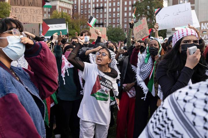 FIle- Palestinian supporters gather for a protest at Columbia University, Thursday, Oct. 12, 20 ...