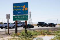 Cars travel to California on Interstate 15 as they pass over the state border on Monday, Sept. ...