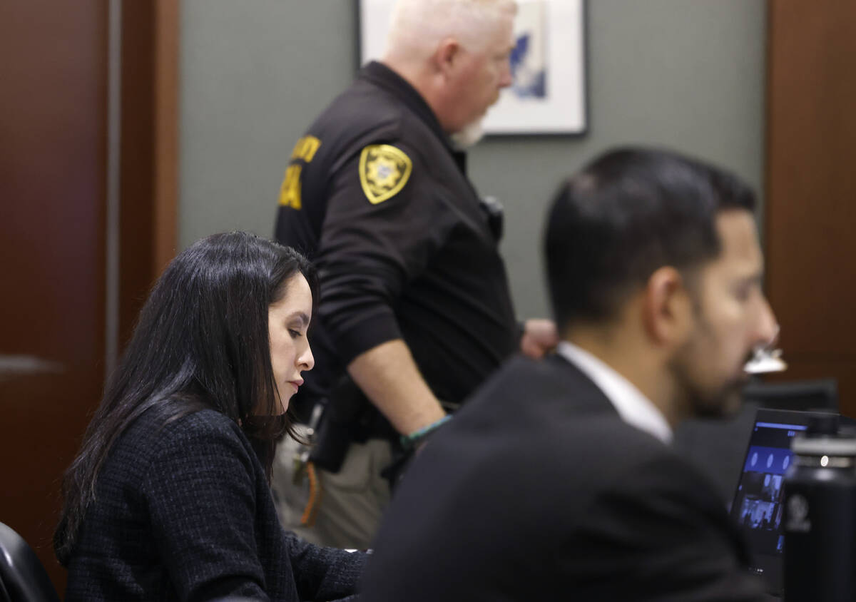 Arlene Heshmati, a public defender, takes notes as she attends a competency hearing at the Regi ...