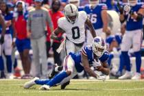 Raiders cornerback Jakorian Bennett (0) closes in on Buffalo Bills wide receiver Gabe Davis (13 ...