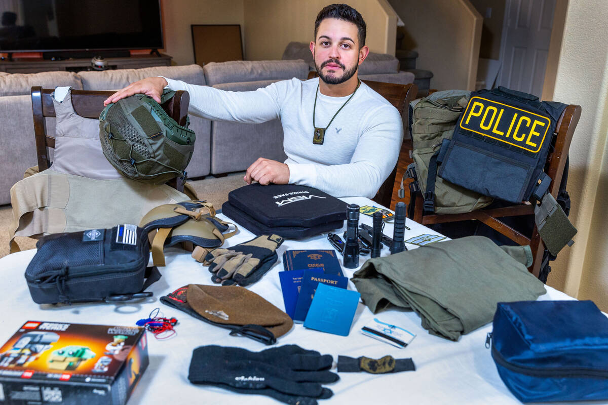 Ariel Salley with all his gear to bring laid out on his dining room table at home. He is a Metr ...