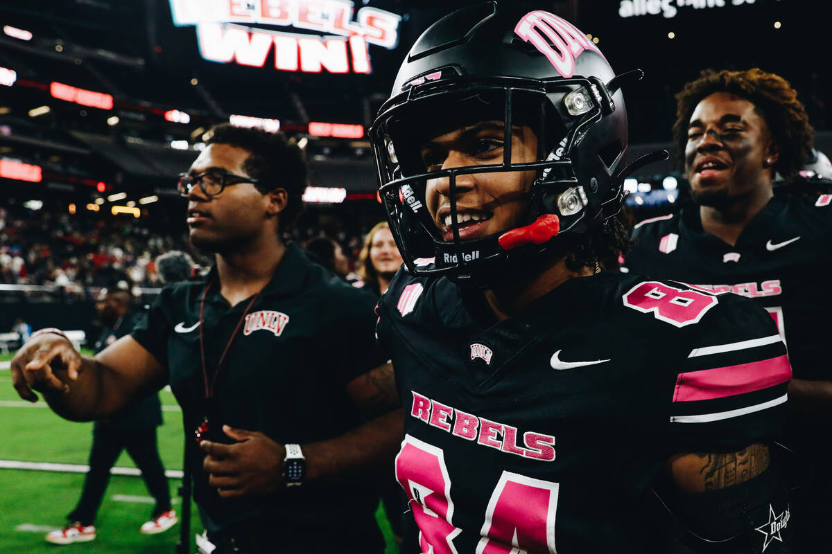 UNLV wide receiver Corey Thompson Jr. (84) celebrates after beating Colorado State and becoming ...