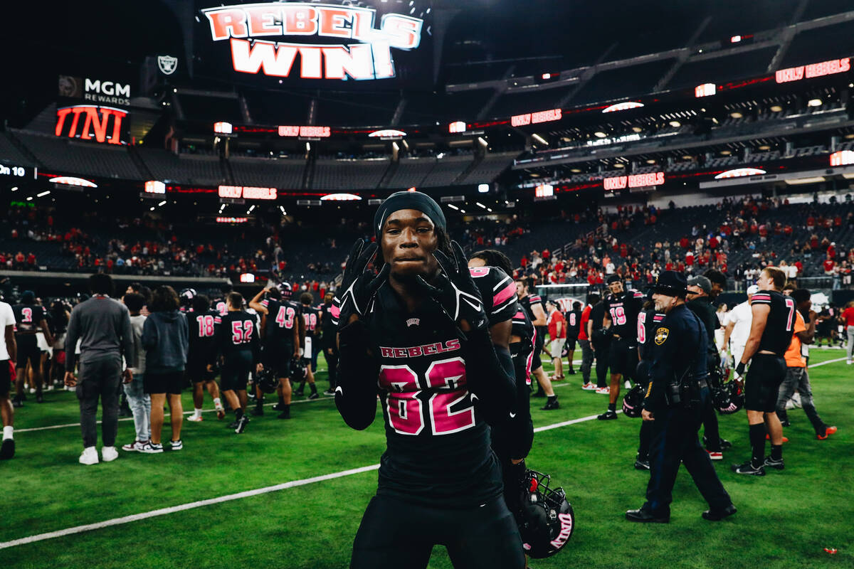 UNLV wide receiver Rashawn Jackson (82) celebrates after beating Colorado State and becoming bo ...