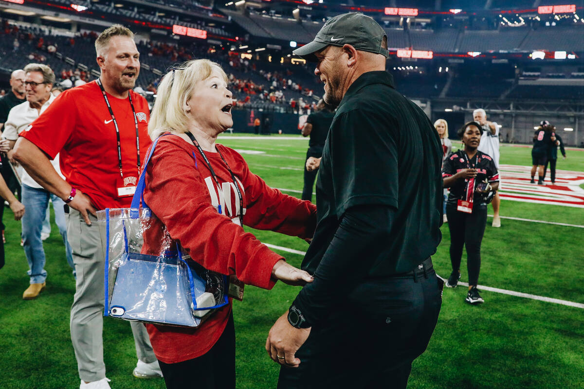 UNLV head coach Barry Odom celebrates after beating Colorado State and becoming bowl eligible a ...