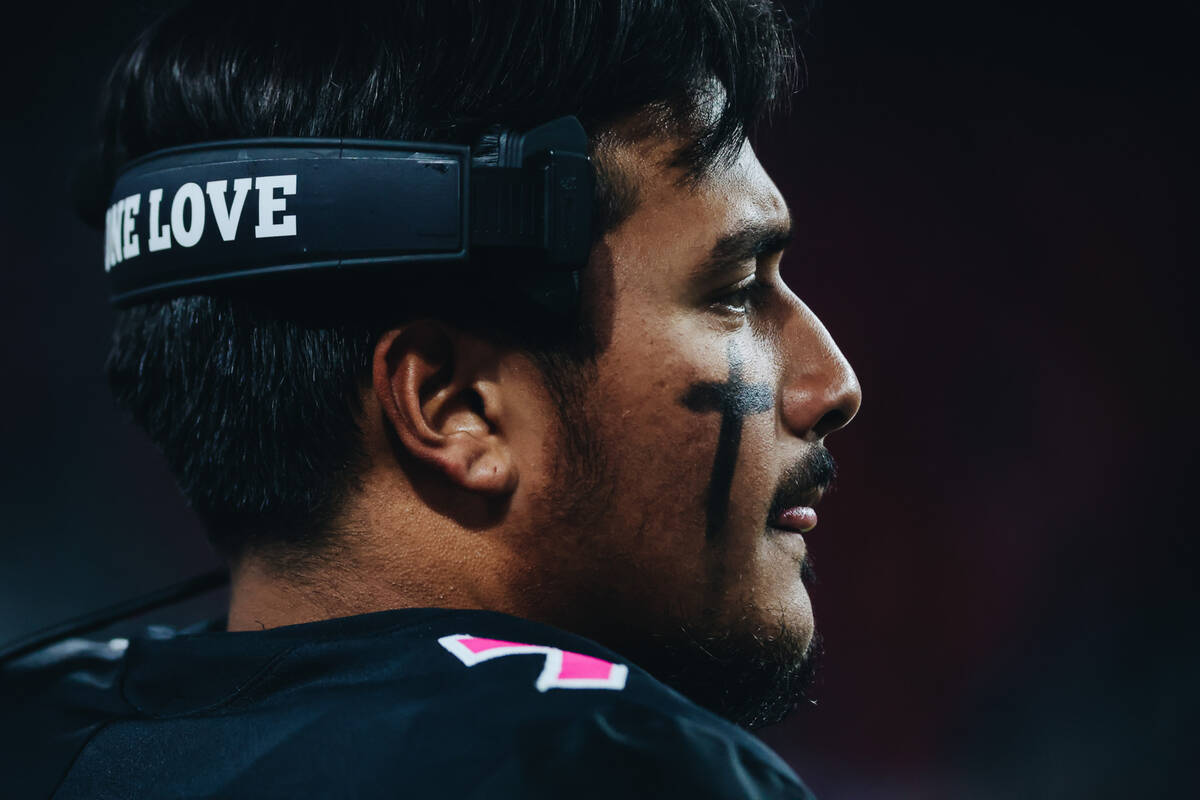 UNLV quarterback Cameron Friel watches his team from the sidelines during the last few minutes ...