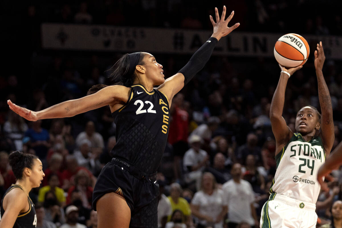 Las Vegas Aces forward A'ja Wilson (22) jumps to block a shot by Seattle Storm guard Jewell Loy ...