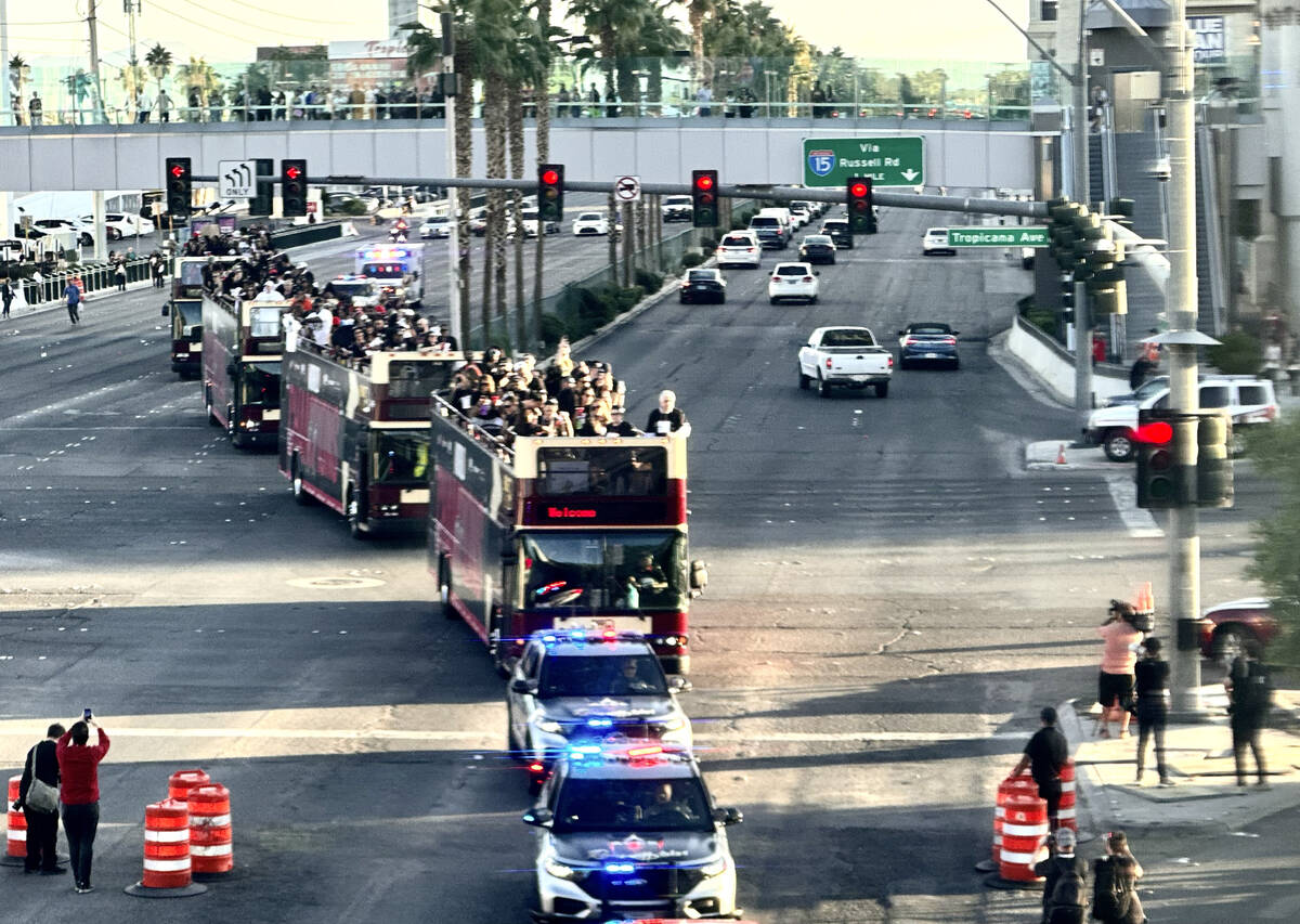 The Las Vegas Aces head up the Las Vegas Strip on their way to a repeat world championship cele ...