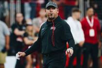 UNLV head coach Barry Odom leads warm ups prior to a game against Colorado State at Allegiant S ...