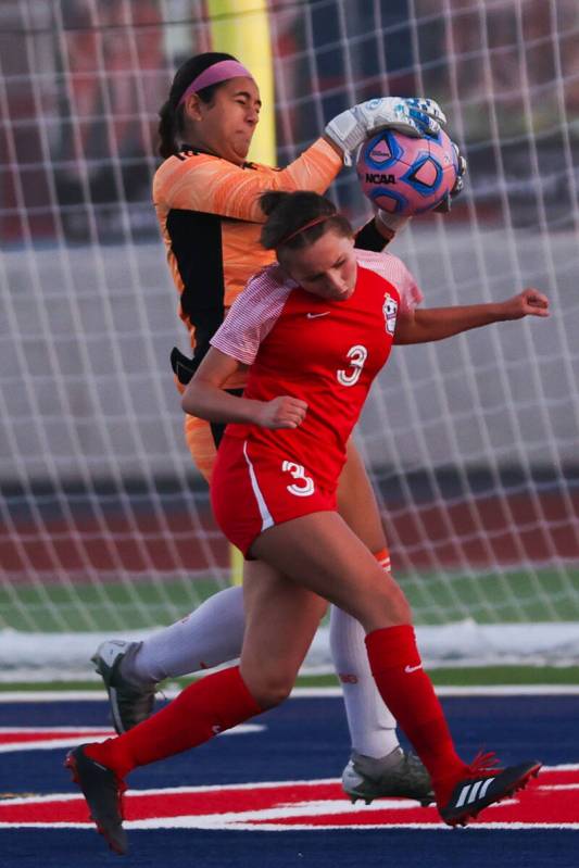 Bishop Gorman’s goalies blocks a shot taken by a Coronado player during a soccer game be ...