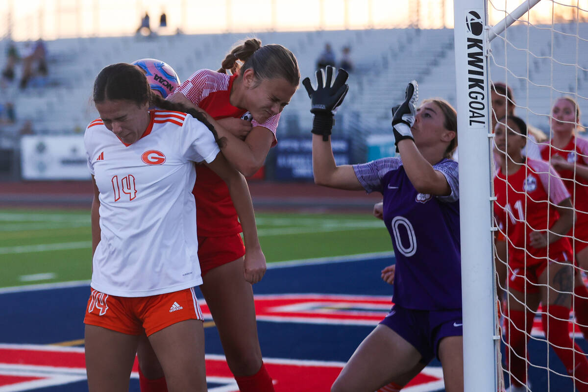 Bishop Gorman’s Jaelah Licea-Greene (14) misses a header while Coronado’s Megan K ...