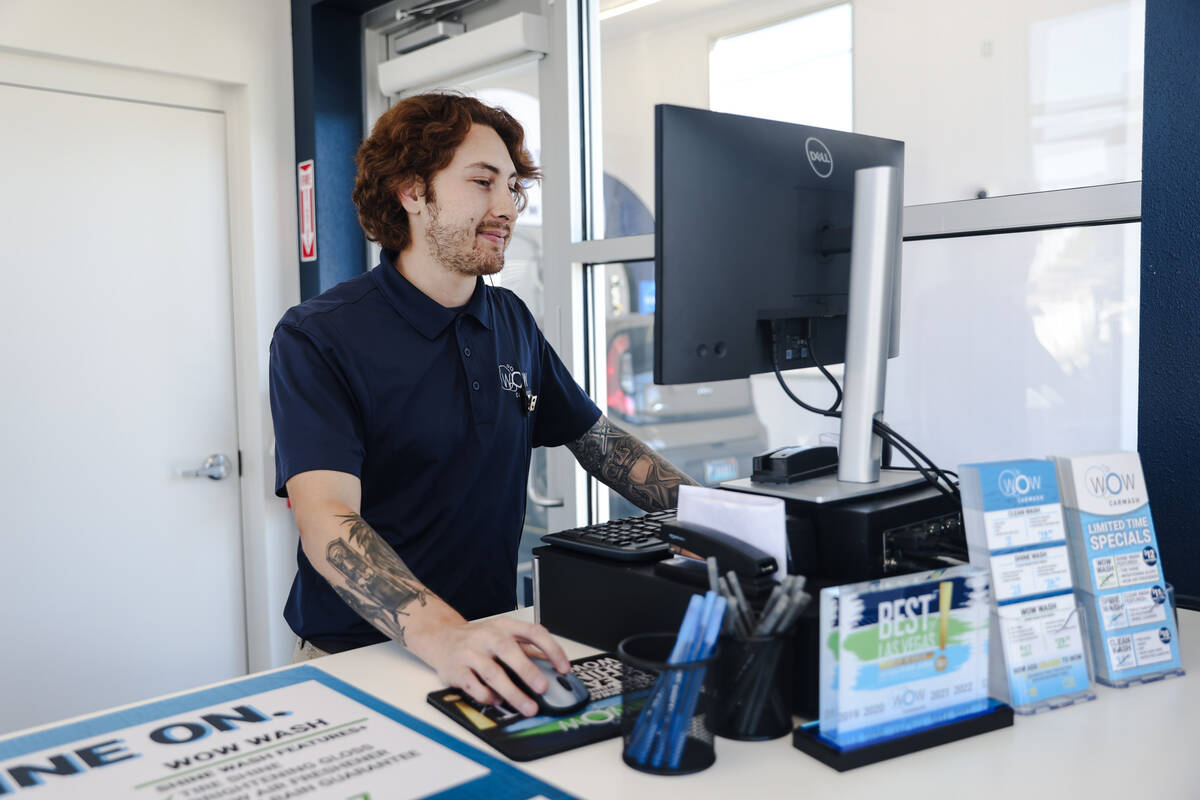 Employee Alex Lundstrom works at the Wow Carwash location on Pecos Road in Las Vegas, Tuesday, ...