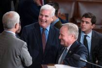 FILE—House Majority Whip Tom Emmer, R-Minn., center, is flanked by Rep. Patrick McHenry, ...