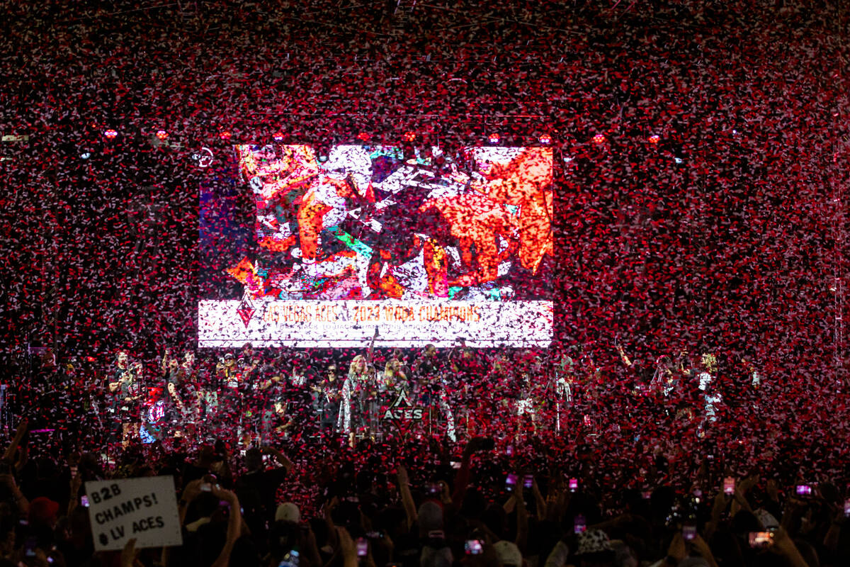 Confetti rains down on the Aces during their championship celebration at Toshiba Plaza at T-Mob ...