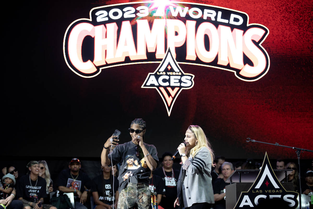 Las Vegas Aces guard Sydney Colson and head coach Becky Hammon go live on social media during a ...