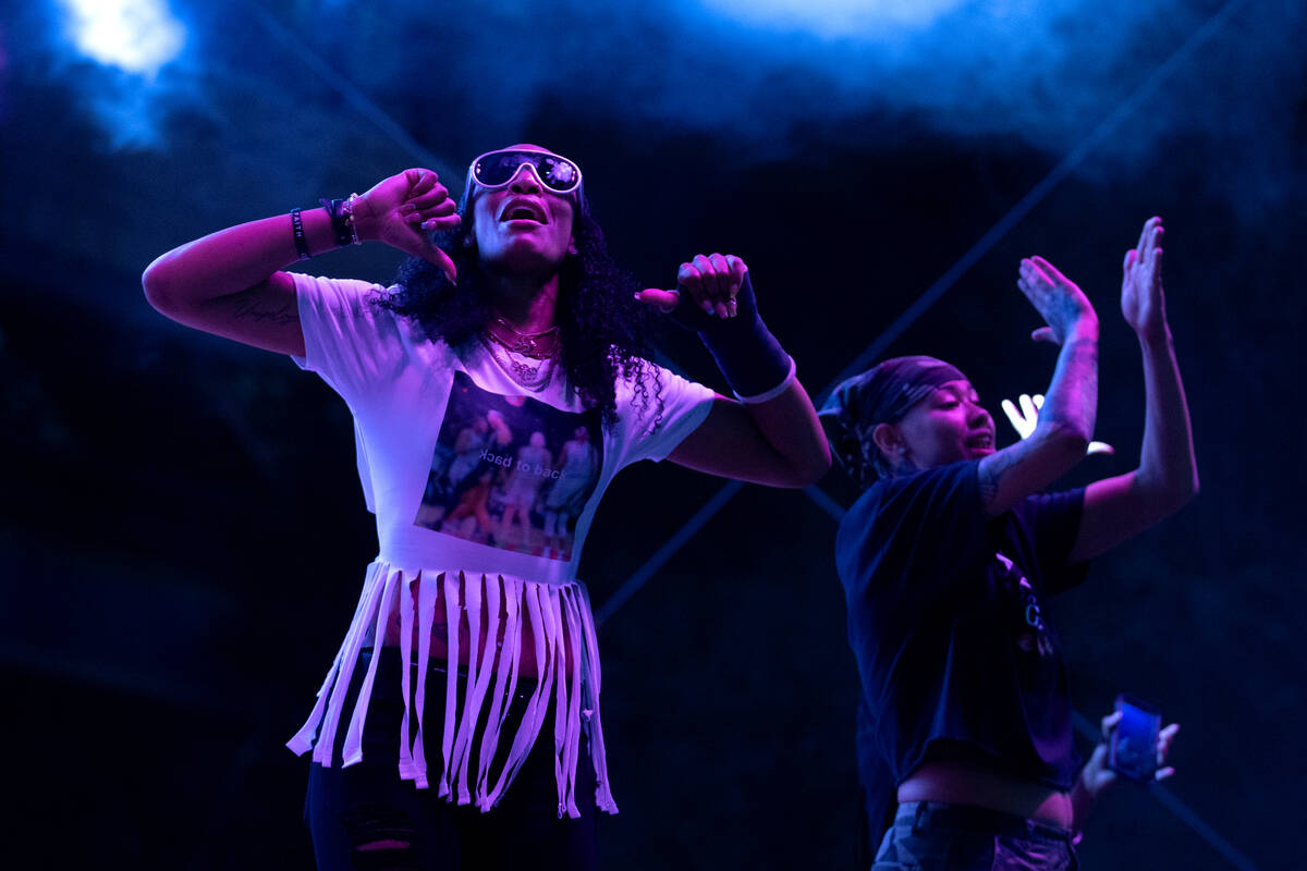 Las Vegas Aces forward A'ja Wilson and guard Kierstan Bell dance on stage to a 2Chainz performa ...