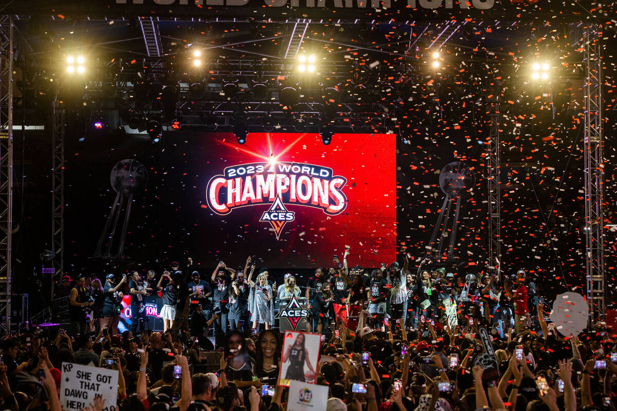 Confetti rains down on the Aces during their championship celebration at Toshiba Plaza at T-Mob ...