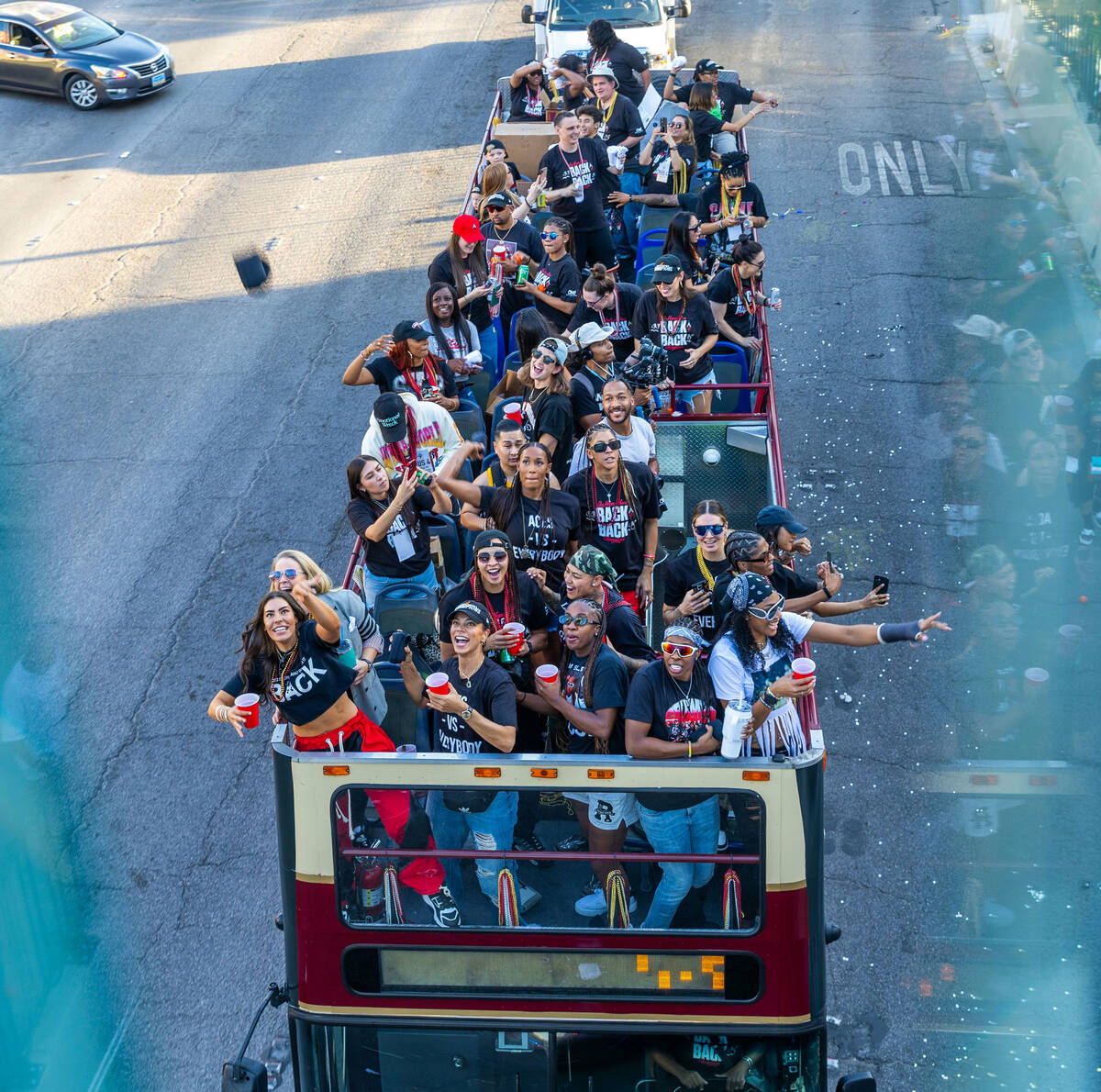 The Aces have fun with the fans during their championship parade along Las Vegas Boulevard to T ...